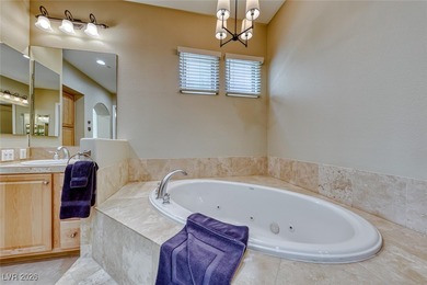 Welcome to 65 Luce Del Sole Villa 1, in beautiful Lake Las on Reflection Bay Golf Club in Nevada - for sale on GolfHomes.com, golf home, golf lot