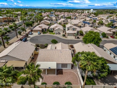 This beautifully updated home offers a spacious layout with a on Palm Valley Golf Club  in Arizona - for sale on GolfHomes.com, golf home, golf lot