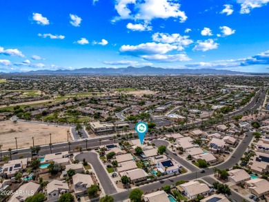This beautifully updated home offers a spacious layout with a on Palm Valley Golf Club  in Arizona - for sale on GolfHomes.com, golf home, golf lot