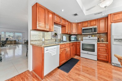 Discover resplendent living at the serene 2802 Victoria Way K4 on Wynmoor Golf Course in Florida - for sale on GolfHomes.com, golf home, golf lot
