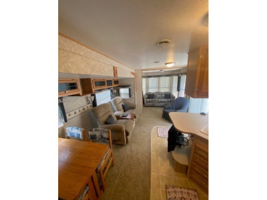 Large Park Trailer with two bedrooms.  One and one half on Captains Cove Golf and Yacht Club in Virginia - for sale on GolfHomes.com, golf home, golf lot