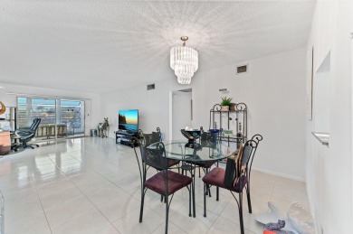 Discover resplendent living at the serene 2802 Victoria Way K4 on Wynmoor Golf Course in Florida - for sale on GolfHomes.com, golf home, golf lot