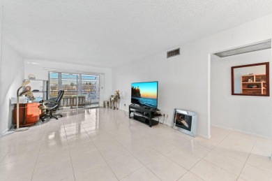 Discover resplendent living at the serene 2802 Victoria Way K4 on Wynmoor Golf Course in Florida - for sale on GolfHomes.com, golf home, golf lot