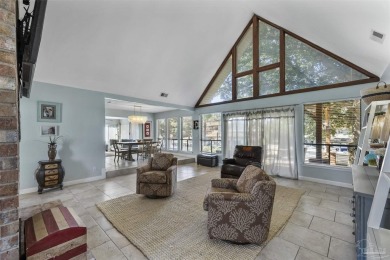 Enjoy the Gulf Breeze lifestyle in this waterfront home with on Tiger Point Golf and Country Club in Florida - for sale on GolfHomes.com, golf home, golf lot