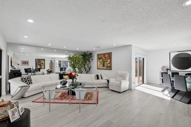 Welcome to this spacious and beautifully located first-floor on Hunters Run Golf and Country Club in Florida - for sale on GolfHomes.com, golf home, golf lot