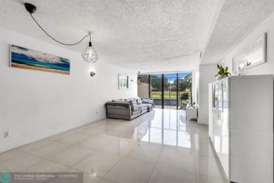 Welcome to this exceptional corner townhouse in the heart of on Pembroke Lakes Golf Club in Florida - for sale on GolfHomes.com, golf home, golf lot