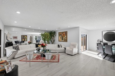 Welcome to this spacious and beautifully located first-floor on Hunters Run Golf and Country Club in Florida - for sale on GolfHomes.com, golf home, golf lot