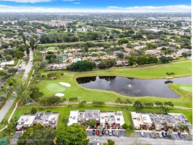 Welcome to this exceptional corner townhouse in the heart of on Pembroke Lakes Golf Club in Florida - for sale on GolfHomes.com, golf home, golf lot