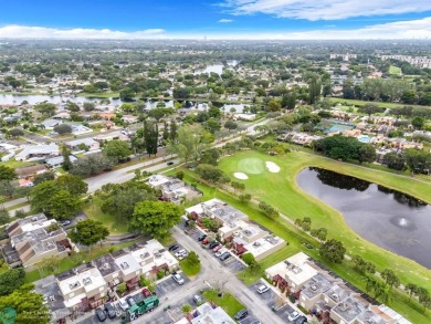 Welcome to this exceptional corner townhouse in the heart of on Pembroke Lakes Golf Club in Florida - for sale on GolfHomes.com, golf home, golf lot