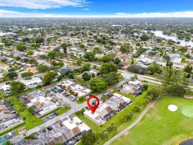 Welcome to this exceptional corner townhouse in the heart of on Pembroke Lakes Golf Club in Florida - for sale on GolfHomes.com, golf home, golf lot