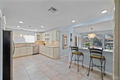 Enjoy the Gulf Breeze lifestyle in this waterfront home with on Tiger Point Golf and Country Club in Florida - for sale on GolfHomes.com, golf home, golf lot