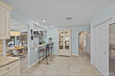 Enjoy the Gulf Breeze lifestyle in this waterfront home with on Tiger Point Golf and Country Club in Florida - for sale on GolfHomes.com, golf home, golf lot