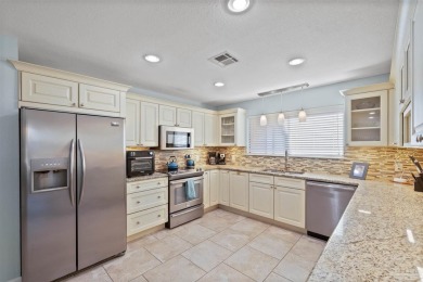 Enjoy the Gulf Breeze lifestyle in this waterfront home with on Tiger Point Golf and Country Club in Florida - for sale on GolfHomes.com, golf home, golf lot