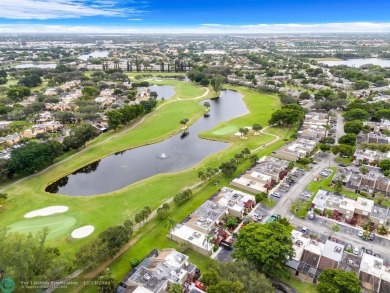 Welcome to this exceptional corner townhouse in the heart of on Pembroke Lakes Golf Club in Florida - for sale on GolfHomes.com, golf home, golf lot