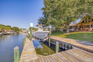 Enjoy the Gulf Breeze lifestyle in this waterfront home with on Tiger Point Golf and Country Club in Florida - for sale on GolfHomes.com, golf home, golf lot