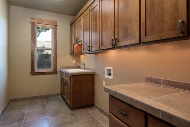 Exquisite custom home offering luxury, privacy & views, with on Rivers Edge Golf Resort in Oregon - for sale on GolfHomes.com, golf home, golf lot