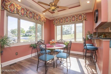 Golf course views, sun-filled rooms, and a massive 23x43 4-car on Tellico Village -The Links At Kahite Golf Course in Tennessee - for sale on GolfHomes.com, golf home, golf lot