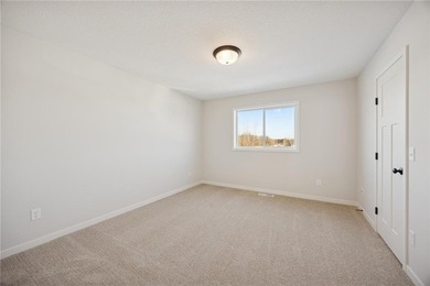 Welcome home to this stunning end-unit townhome built by local on Territory Golf Club in Minnesota - for sale on GolfHomes.com, golf home, golf lot