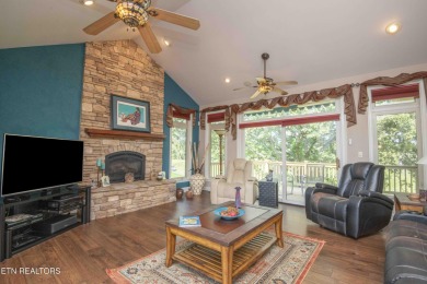 Golf course views, sun-filled rooms, and a massive 23x43 4-car on Tellico Village -The Links At Kahite Golf Course in Tennessee - for sale on GolfHomes.com, golf home, golf lot