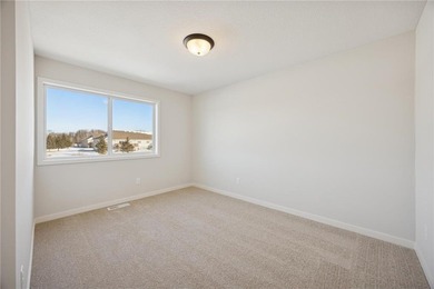 Welcome home to this stunning end-unit townhome built by local on Territory Golf Club in Minnesota - for sale on GolfHomes.com, golf home, golf lot