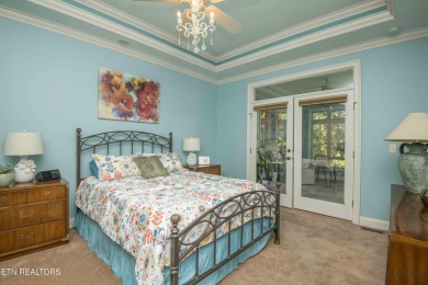 Golf course views, sun-filled rooms, and a massive 23x43 4-car on Tellico Village -The Links At Kahite Golf Course in Tennessee - for sale on GolfHomes.com, golf home, golf lot
