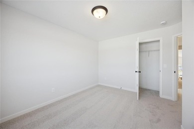 Welcome home to this stunning end-unit townhome built by local on Territory Golf Club in Minnesota - for sale on GolfHomes.com, golf home, golf lot