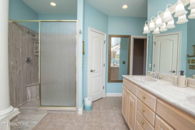 Golf course views, sun-filled rooms, and a massive 23x43 4-car on Tellico Village -The Links At Kahite Golf Course in Tennessee - for sale on GolfHomes.com, golf home, golf lot