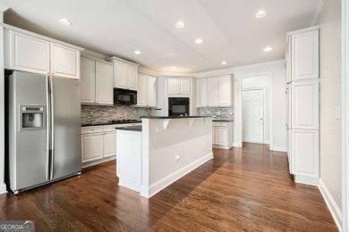 Step into refined comfort in this beautifully updated Bridgemill on Bridgemill Golf Club in Georgia - for sale on GolfHomes.com, golf home, golf lot