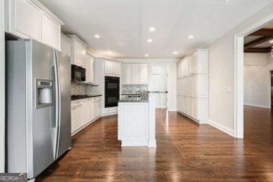 Step into refined comfort in this beautifully updated Bridgemill on Bridgemill Golf Club in Georgia - for sale on GolfHomes.com, golf home, golf lot