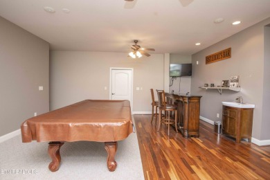Golf course views, sun-filled rooms, and a massive 23x43 4-car on Tellico Village -The Links At Kahite Golf Course in Tennessee - for sale on GolfHomes.com, golf home, golf lot