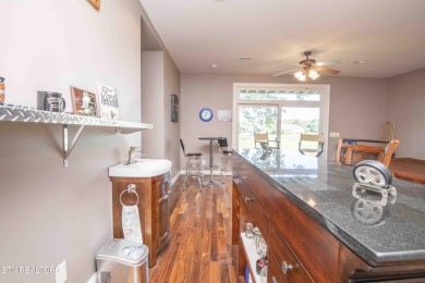 Golf course views, sun-filled rooms, and a massive 23x43 4-car on Tellico Village -The Links At Kahite Golf Course in Tennessee - for sale on GolfHomes.com, golf home, golf lot