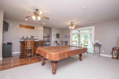 Golf course views, sun-filled rooms, and a massive 23x43 4-car on Tellico Village -The Links At Kahite Golf Course in Tennessee - for sale on GolfHomes.com, golf home, golf lot