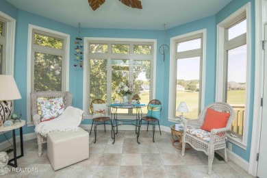 Golf course views, sun-filled rooms, and a massive 23x43 4-car on Tellico Village -The Links At Kahite Golf Course in Tennessee - for sale on GolfHomes.com, golf home, golf lot