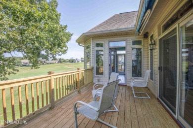 Golf course views, sun-filled rooms, and a massive 23x43 4-car on Tellico Village -The Links At Kahite Golf Course in Tennessee - for sale on GolfHomes.com, golf home, golf lot