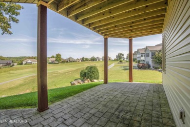 Golf course views, sun-filled rooms, and a massive 23x43 4-car on Tellico Village -The Links At Kahite Golf Course in Tennessee - for sale on GolfHomes.com, golf home, golf lot