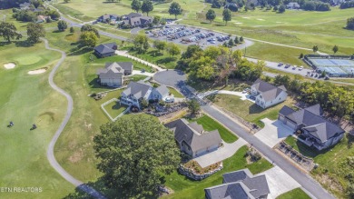 Golf course views, sun-filled rooms, and a massive 23x43 4-car on Tellico Village -The Links At Kahite Golf Course in Tennessee - for sale on GolfHomes.com, golf home, golf lot