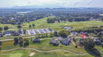 Golf course views, sun-filled rooms, and a massive 23x43 4-car on Tellico Village -The Links At Kahite Golf Course in Tennessee - for sale on GolfHomes.com, golf home, golf lot