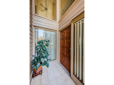 Under contract-accepting backup offers. NEW PRICE!! This warm on East Lake Woodlands Country Club in Florida - for sale on GolfHomes.com, golf home, golf lot