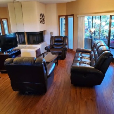 Under contract-accepting backup offers. NEW PRICE!! This warm on East Lake Woodlands Country Club in Florida - for sale on GolfHomes.com, golf home, golf lot