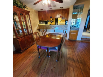 Under contract-accepting backup offers. NEW PRICE!! This warm on East Lake Woodlands Country Club in Florida - for sale on GolfHomes.com, golf home, golf lot