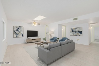 Welcome to this bright and charming end-unit garden condo in Sun on Pebblebrook Golf Course in Arizona - for sale on GolfHomes.com, golf home, golf lot