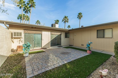 Welcome to this bright and charming end-unit garden condo in Sun on Pebblebrook Golf Course in Arizona - for sale on GolfHomes.com, golf home, golf lot