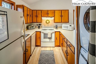 GOLF COURSE LOCATION - alongside 11TH FAIRWAY - 300 feet to the on Beech Mountain Club in North Carolina - for sale on GolfHomes.com, golf home, golf lot