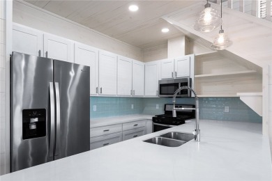 Charming coastal cottage in the desirable Nautilus Subdivision on Palmilla Beach Golf Club in Texas - for sale on GolfHomes.com, golf home, golf lot