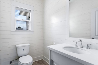 Charming coastal cottage in the desirable Nautilus Subdivision on Palmilla Beach Golf Club in Texas - for sale on GolfHomes.com, golf home, golf lot