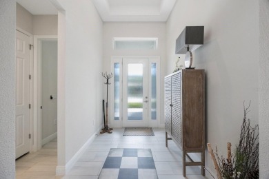 Discover refined, coastal, luxury living in this immaculate on IMG Academies Golf and Country Club in Florida - for sale on GolfHomes.com, golf home, golf lot