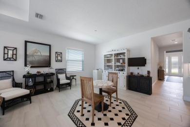 Discover refined, coastal, luxury living in this immaculate on IMG Academies Golf and Country Club in Florida - for sale on GolfHomes.com, golf home, golf lot