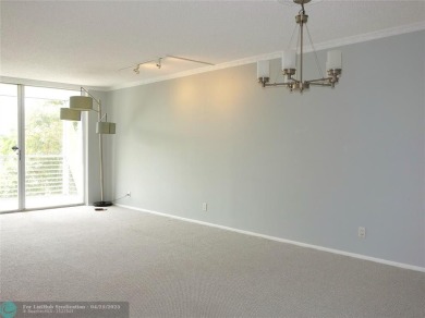 OUTSTANDING GOLF COURSE VIEWS from this 3 bedroom 2 bath bright on Palm-Aire Country Club and Resort - Palms in Florida - for sale on GolfHomes.com, golf home, golf lot