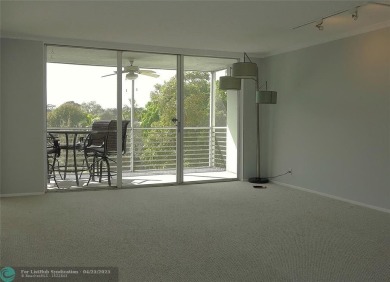 OUTSTANDING GOLF COURSE VIEWS from this 3 bedroom 2 bath bright on Palm-Aire Country Club and Resort - Palms in Florida - for sale on GolfHomes.com, golf home, golf lot