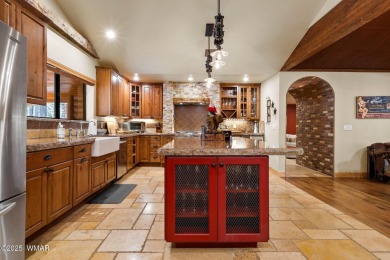 Discover elegant living paired with the charm of the southwest on Pinetop Lakes Country Club in Arizona - for sale on GolfHomes.com, golf home, golf lot